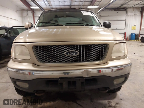 1999 Ford F-150 z VIN 2FTRX18W9XCA83920, wystawiony jako IAAI lot #41875700 z przebiegiem 234 325 mil mil oraz . Historia ofert i sprzedaży dostępna na DreamBid. Obrazek 13.