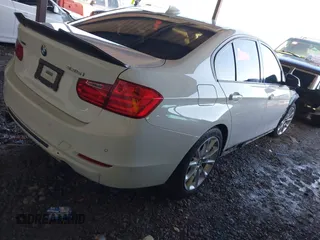 2014 BMW 3 Series 335i xDrive with VIN WBA3B9G59ENR92174, listed as a IAAI auction lot 41456958 with 117,141 mi miles and . Bid and sale history available at DreamBid. Image 4.