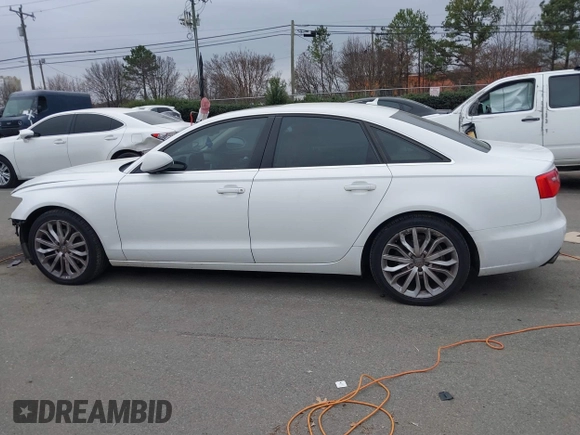 2013 Audi A6 Premium Plus with VIN WAUGFAFC6DN051237, listed as a IAAI auction lot 41553452 with 114,446 mi miles and . Bid and sale history available at DreamBid. Image 15.