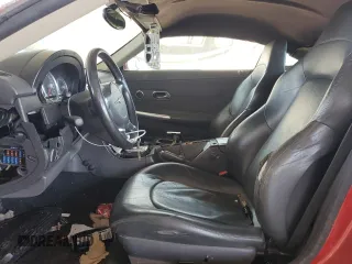 2004 Chrysler Crossfire z VIN 1C3AN69L64X015349, wystawiony jako Copart lot #57865295 z przebiegiem 255 981 mil mil oraz Tytuł czysty. Historia ofert i sprzedaży dostępna na DreamBid. Obrazek 7.