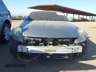 2006 Nissan 350Z with VIN JN1AZ34D56M306544, listed as a IAAI auction lot 42000765 with 150,126 mi miles. Bid and sale history available at carsss.com. Image 6.
