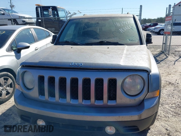 2014 Jeep Patriot Sport with VIN 1C4NJPBBXED757823, listed as a IAAI auction lot 41839740 with 186,218 mi miles and . Bid and sale history available at carsss.com. Image 6.