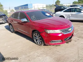 2015 Chevrolet Impala LTZ with VIN 2G1165S34F9116526, listed as a IAAI auction lot 42104754 with 145,961 mi miles. Bid and sale history available at carsss.com. Image 1.