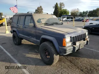1996 Jeep Cherokee Sport with VIN 1J4FT68S4TL333342, listed as a Copart auction lot 41664965 with 185,199 mi miles and Clean Title. Bid and sale history available at carsss.com. Image 4.