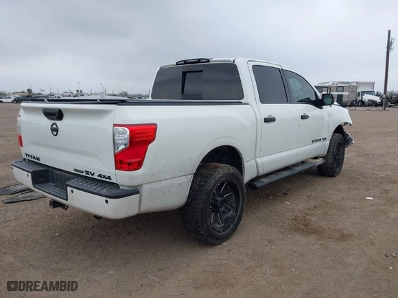 2019 Nissan Titan SV with VIN 1N6AA1E59KN530160, listed as a IAAI auction lot 41557126 with 128,594 mi miles. Bid and sale history available at carsss.com. Image 4.