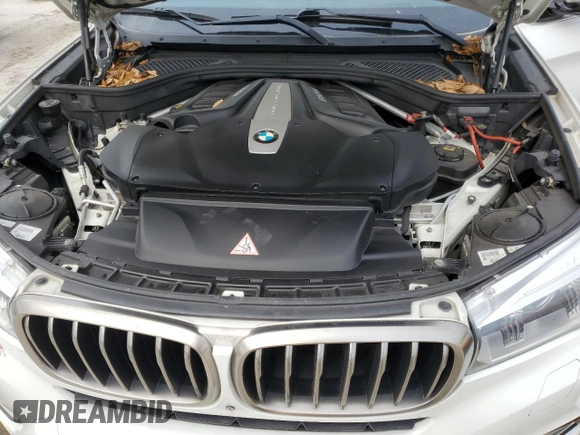 2015 BMW X6 xDrive50i with VIN 5UXKU6C55F0F94151, listed as a Copart auction lot 46826775 with 129,925 mi miles and Salvage Title. Bid and sale history available at carsss.com. Image 12.