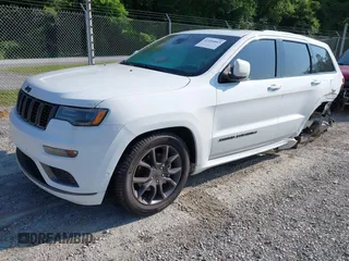 2021 Jeep Grand Cherokee Overland with VIN 1C4RJFCG3MC502165, listed as a IAAI auction lot 42404863 with 100,197 mi miles and . Bid and sale history available at DreamBid. Image 2.