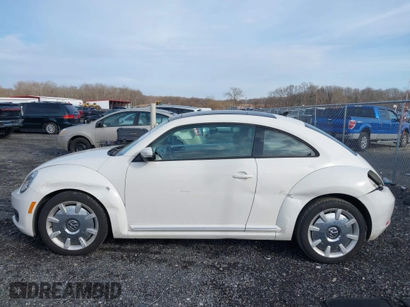 2014 Volkswagen Beetle 2.5L w/Sun with VIN 3VWJP7AT8EM611560, listed as a IAAI auction lot 41488488 with 140,798 mi miles and . Bid and sale history available at DreamBid. Image 15.