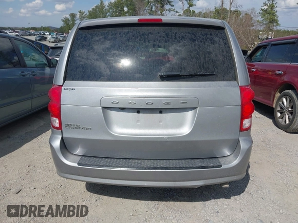 2015 Dodge Grand Caravan American Value with VIN 2C4RDGBG6FR576897, listed as a IAAI auction lot 41780897 with 159,823 mi miles and . Bid and sale history available at DreamBid. Image 16.