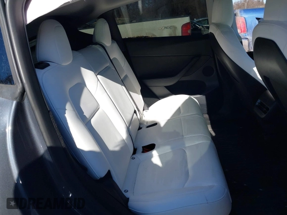 2023 Tesla Model Y Performance with VIN 7SAYGDEF1PF674417, listed as a IAAI auction lot 41421594 with 28,928 mi miles and . Bid and sale history available at DreamBid. Image 8.