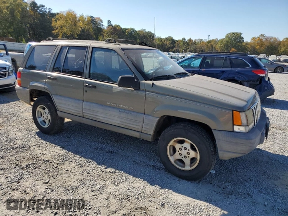 1998 Jeep Grand Cherokee Laredo with VIN 1J4GZ58S5WC165213, listed as a Copart auction lot 77611434 with 168,688 mi miles and Salvage Title. Bid and sale history available at carsss.com. Image 4.