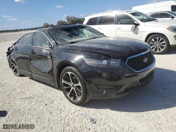 2014 Ford Taurus SHO with VIN 1FAHP2KT4EG160775, listed as a Copart auction lot 77162374 with 0 mi miles and Salvage Title. Bid and sale history available at carsss.com. Image 4.