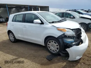 2009 Scion xD with VIN JTKKU10499J033911, listed as a Copart auction lot 51537495 with 123,584 mi miles and Salvage Title. Bid and sale history available at carsss.com. Image 4.