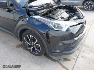 2019 Toyota C-HR XLE with VIN NMTKHMBX2KR094898, listed as a IAAI auction lot 41940883 with 94,351 mi miles. Bid and sale history available at carsss.com. Image 6.