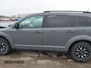 2019 Dodge Journey SE Value with VIN 3C4PDCAB5KT866156, listed as a IAAI auction lot 41910368 with 123,025 mi miles and . Bid and sale history available at DreamBid. Image 14.