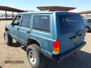 1997 Jeep Cherokee Sport with VIN 1J4FJ68S4VL592390, listed as a IAAI auction lot 41682369 with 194,624 mi miles. Bid and sale history available at carsss.com. Image 3.