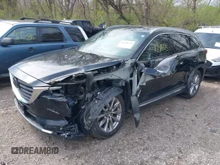 2020 Mazda CX-9 Grand Touring with VIN JM3TCBDY3L0419049, listed as a IAAI auction lot 41948393 with 70,163 mi miles and . Bid and sale history available at DreamBid. Image 20.