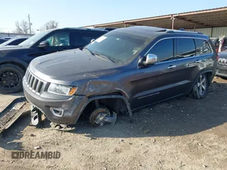 2014 Jeep Grand Cherokee Limited with VIN 1C4RJEBGXEC499052, listed as a IAAI auction lot 41665838 with 160,473 mi miles. Bid and sale history available at carsss.com. Image 17.