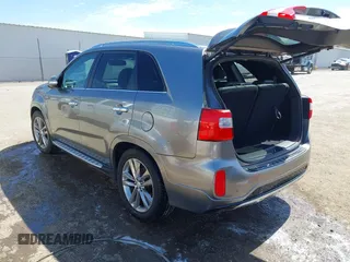 2015 Kia Sorento SX with VIN 5XYKWDA74FG591902, listed as a IAAI auction lot 41856991 with 128,471 mi miles. Bid and sale history available at carsss.com. Image 3.