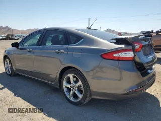 2014 Ford Fusion SE Hybrid with VIN 3FA6P0LU3ER306739, listed as a Copart auction lot 69887454 with 114,150 mi miles and Salvage title. Bid and sale history available at DreamBid. Image 2.