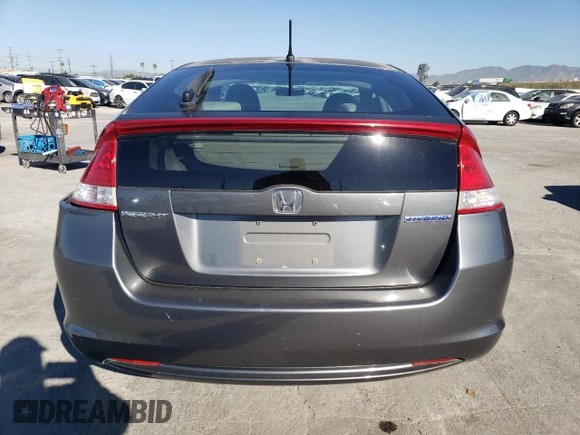 2010 Honda Insight EX with VIN JHMZE2H73AS039935, listed as a Copart auction lot 46192575 with 127,329 mi miles and Salvage Title. Bid and sale history available at DreamBid. Image 6.