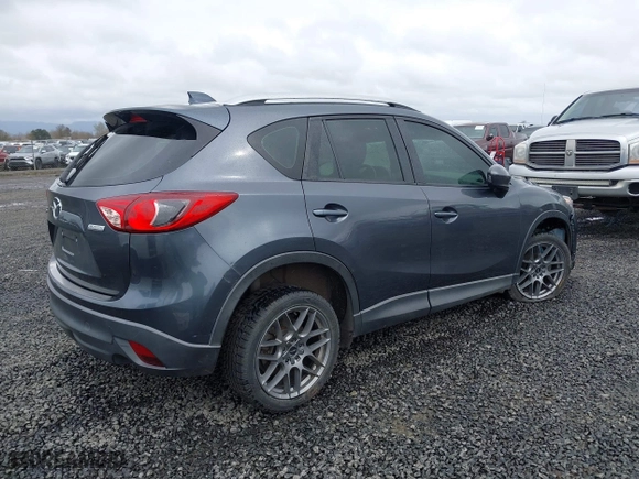 2013 Mazda CX-5 Sport with VIN JM3KE2BE7D0154040, listed as a IAAI auction lot 41842013 with 132,382 mi miles. Bid and sale history available at carsss.com. Image 4.