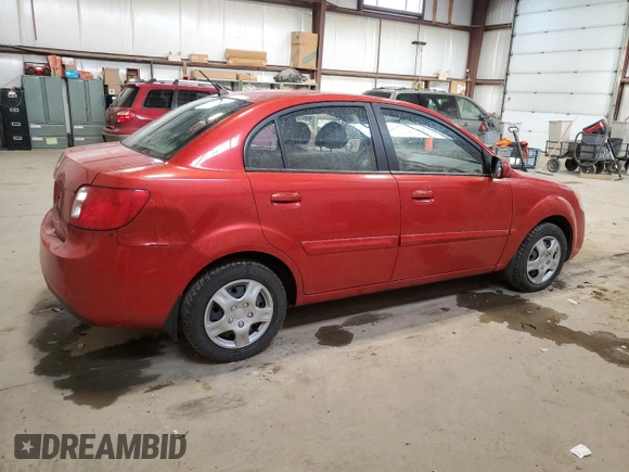 2010 Kia Rio with VIN KNADH4B39A6691792, listed as a Copart auction lot 80043064 with 161,139 mi miles and Salvage Title. Bid and sale history available at DreamBid. Image 3.