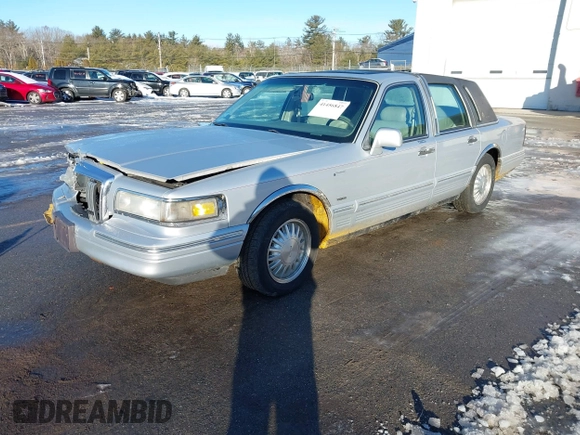 1997 Lincoln Town Car Cartier with VIN 1LNLM83W9VY661126, listed as a IAAI auction lot 41456847 with 160,710 mi miles and . Bid and sale history available at DreamBid. Image 17.