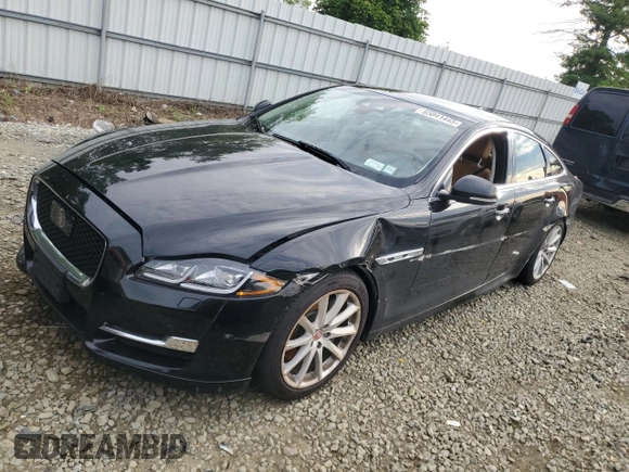 2019 Jaguar XJ R-Sport with VIN SAJWJ1CD1K8W18574, listed as a Copart auction lot 65041445 with 101,072 mi miles and Clean title. Bid and sale history available at DreamBid. Image 1.