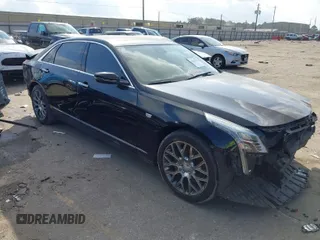 2018 Cadillac CT6 Luxury AWD with VIN 1G6KD5RS4JU100954, listed as a IAAI auction lot 41512623 with 62,744 mi miles. Bid and sale history available at carsss.com. Image 1.