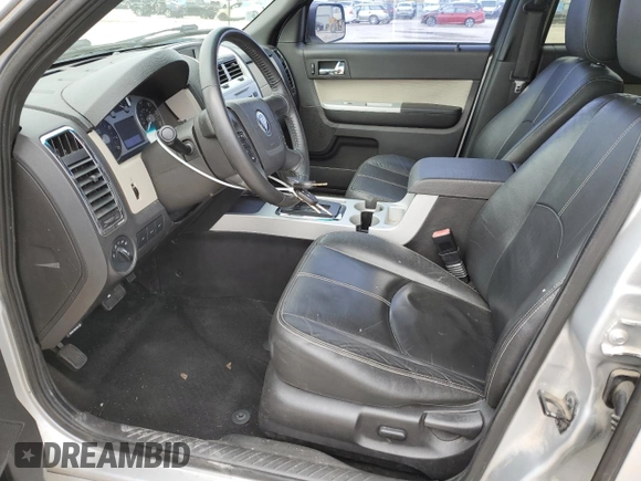 2011 Mercury Mariner z VIN 4M2CN8B73BKJ06886, wystawiony jako Copart lot #50308485 z przebiegiem 118 584 mil mil oraz Szkoda całkowita • Salvage title. Historia ofert i sprzedaży dostępna na DreamBid. Obrazek 7.