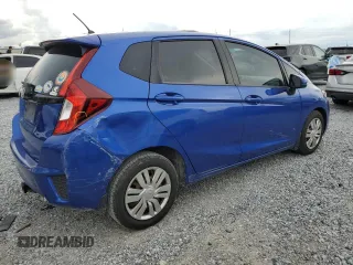 2015 Honda Fit LX with VIN 3HGGK5H50FM726275, listed as a Copart auction lot 56564315 with 123,082 mi miles and Salvage title. Bid and sale history available at DreamBid. Image 3.