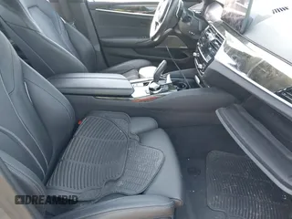 2021 BMW 5 Series 540i xDrive with VIN WBA73BJ03MWX30307, listed as a IAAI auction lot 41891615 with 27,374 mi miles and . Bid and sale history available at DreamBid. Image 5.