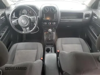 2016 Jeep Patriot Latitude with VIN 1C4NJRFB9GD586698, listed as a Copart auction lot 61131125 with 154,679 mi miles and Salvage title. Bid and sale history available at DreamBid. Image 8.
