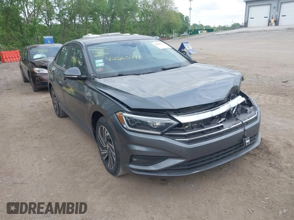2021 Volkswagen Jetta SEL Premium z VIN 3VWG57BU8MM017203, wystawiony jako IAAI lot #42263741 z przebiegiem 26 556 mil mil oraz . Historia ofert i sprzedaży dostępna na DreamBid. Obrazek 1.