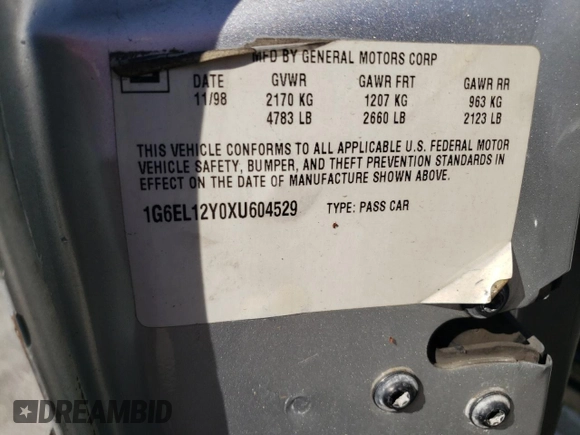 1999 Cadillac Eldorado z VIN 1G6EL12Y0XU604529, wystawiony jako Copart lot #77620004 z przebiegiem 246 032 mil mil oraz Szkoda całkowita • Salvage title. Historia ofert i sprzedaży dostępna na DreamBid. Obrazek 12.