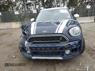 2019 MINI Countryman Cooper S z VIN WMZYT5C54K3G92704, wystawiony jako IAAI lot #41821521 z przebiegiem 95 087 mil mil oraz . Historia ofert i sprzedaży dostępna na DreamBid. Obrazek 13.