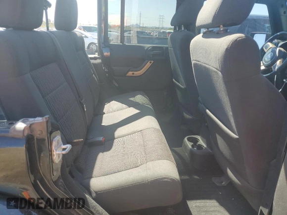 2014 Jeep Wrangler Unlimited Sahara with VIN 1C4BJWEGXEL150119, listed as a Copart auction lot 52378075 with 122,443 mi miles and Salvage Title. Bid and sale history available at carsss.com. Image 11.