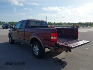 2004 Ford F-150 XL with VIN 1FTPX12544NA71834, listed as a IAAI auction lot 42085768 with 90,902 mi miles. Bid and sale history available at carsss.com. Image 3.
