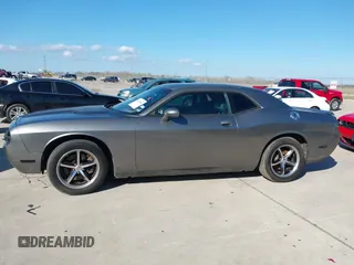 2012 Dodge Challenger SXT Plus with VIN 2C3CDYAG1CH262352, listed as a IAAI auction lot 41662002 with 141,868 mi miles. Bid and sale history available at carsss.com. Image 14.