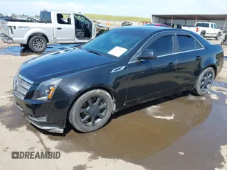 2008 Cadillac CTS RWD with VIN 1G6DV57VX80188428, listed as a IAAI auction lot 42033872 with 132,080 mi miles and . Bid and sale history available at DreamBid. Image 2.