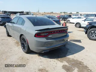 2018 Dodge Charger SXT with VIN 2C3CDXBG4JH187913, listed as a IAAI auction lot 42039379 with 146,618 mi miles and . Bid and sale history available at DreamBid. Image 3.