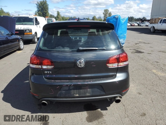 2013 Volkswagen GTI z VIN WVWED7AJ9DW122093, wystawiony jako Copart lot #70051594 z przebiegiem 118 231 mil mil oraz Szkoda całkowita • Salvage title. Historia ofert i sprzedaży dostępna na DreamBid. Obrazek 6.