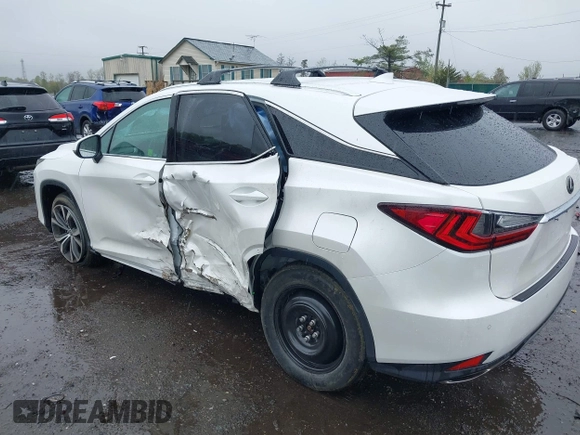 2021 Lexus RX with VIN 2T2HZMDA3MC266624, listed as a IAAI auction lot 42011029 with 27,401 mi miles. Bid and sale history available at carsss.com. Image 3.