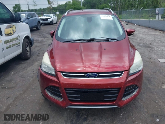 2015 Ford Escape Titanium z VIN 1FMCU0J99FUA92432, wystawiony jako IAAI lot #42257036 z przebiegiem 127 632 mil mil oraz . Historia ofert i sprzedaży dostępna na DreamBid. Obrazek 12.