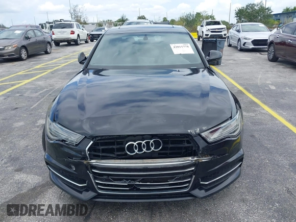 2016 Audi A6 2.0T Premium Plus with VIN WAUGFAFC6GN055826, listed as a IAAI auction lot 42011778 with 98,210 mi miles. Bid and sale history available at carsss.com. Image 12.