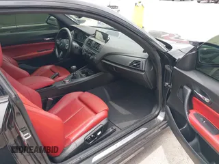 2015 BMW 2 Series M235i with VIN WBA1J7C5XFV289284, listed as a IAAI auction lot 42626668 with 179,944 mi miles and . Bid and sale history available at DreamBid. Image 5.