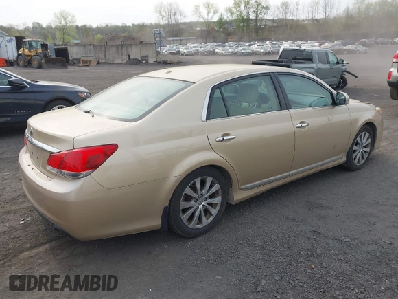 2011 Toyota Avalon with VIN 4T1BK3DB5BU414687, listed as a IAAI auction lot 42103830 with 130,045 mi miles and . Bid and sale history available at carsss.com. Image 4.
