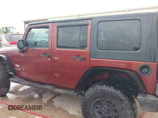2007 Jeep Wrangler Unlimited Sahara with VIN 1J4GB59197L142223, listed as a IAAI auction lot 42025639 with 155,274 mi miles and . Bid and sale history available at DreamBid. Image 14.