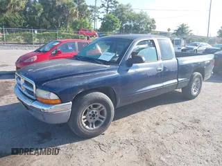 2001 Dodge Dakota Sport with VIN 1B7GL22N51S154848, listed as a IAAI auction lot 41941697 with 195,002 mi miles. Bid and sale history available at carsss.com. Image 2.